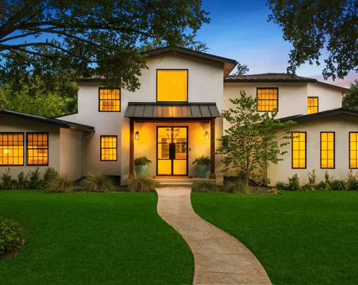 Mahncke Park - dusk exterior of a contemporary two-story home
