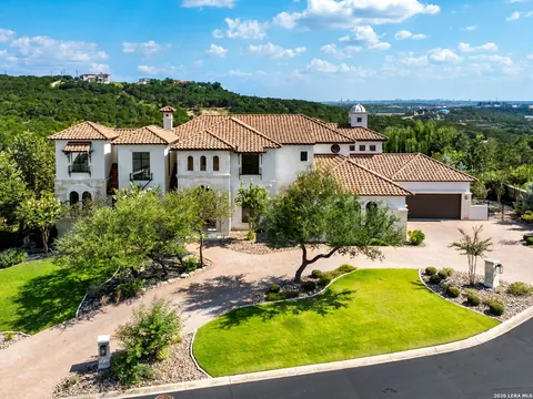The Dominion - aerial view of a Mediterranean-style estate with a circular driveway