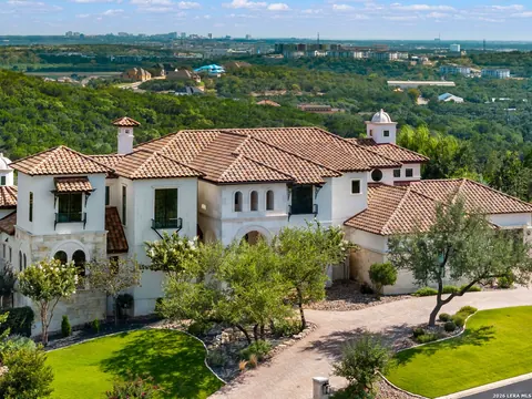 The Dominion - aerial view of a Mediterranean-style mansion with a terracotta roof