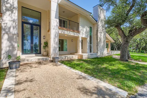 Hill Country Village - front entrance of a contemporary home